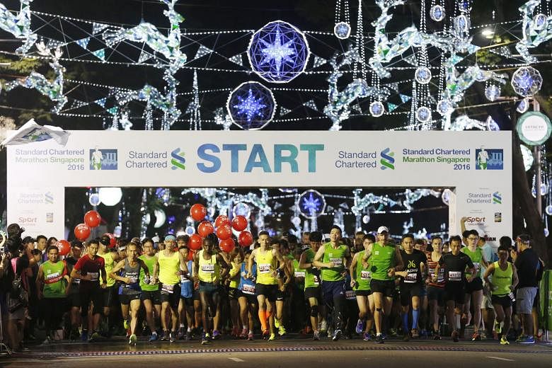 Runners setting off at the start of last year's Standard Chartered Marathon Singapore. This year, the event's marathon category has sold out for the first time in its 16-year history.