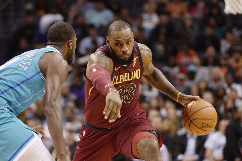 Cleveland Cavaliers forward LeBron James driving past Charlotte Hornets' Michael Kidd-Gilchrist on Wednesday. This was the Cavs' seventh win on the bounce against the Hornets.