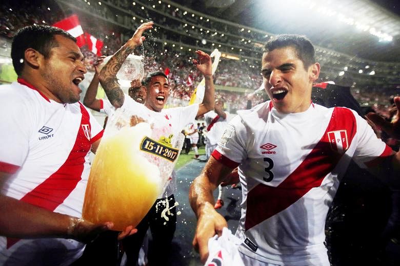 Peruvian players celebrate after becoming the last side to qualify for the 2018 World Cup after their 2-0 second-leg win against New Zealand at the National Stadium, Lima on Wednesday. Peru have not figured in the World Cup Finals since 1982.