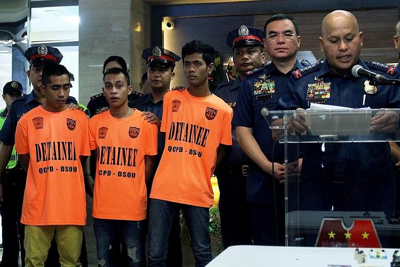 Philippine police chief Ronald de la Rosa speaking at a press conference on the arrests, with the alleged militants present. The police had monitored one suspect's Facebook posts, in which he hinted at a plan to launch attacks in Manila.