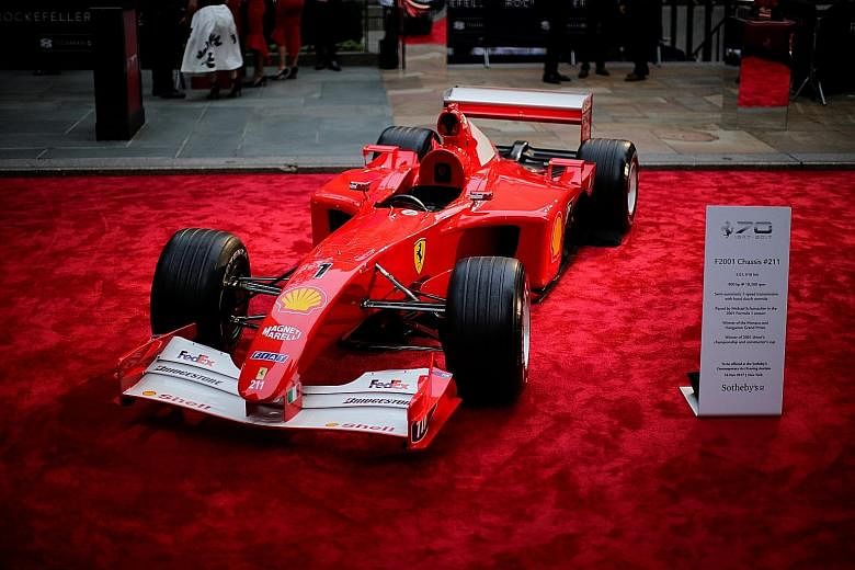 Michael Schumacher's Grand Prix-winning Ferrari, seen here on display at the Rockefeller Plaza in New York last month, sold for US$7.5 million (S$10.2 million) on Thursday at a Sotheby's auction. It was the first time that a rare car was included in 