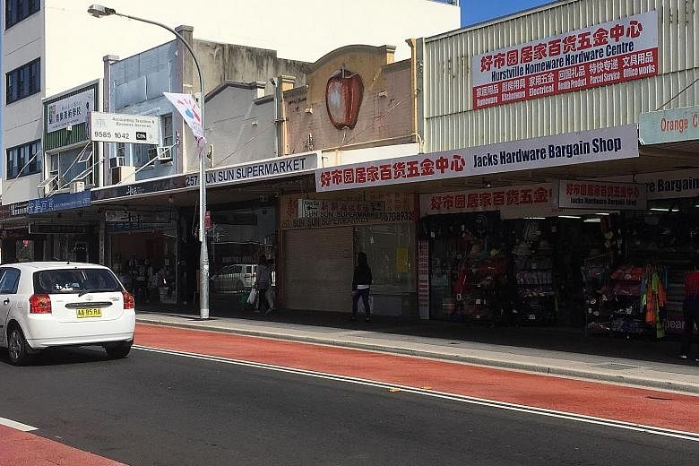 A street in Hurstville with an Asian supermarket and a storefront with Chinese words. According to the 2016 census, 49.4 per cent of Hurstville's 30,000-odd residents are of Chinese ancestry, compared with just 5 per cent who have Australian ancestry