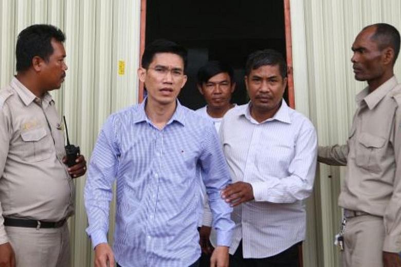 Cambodian Court Charges Two Journalists With Espionage | The Straits Times