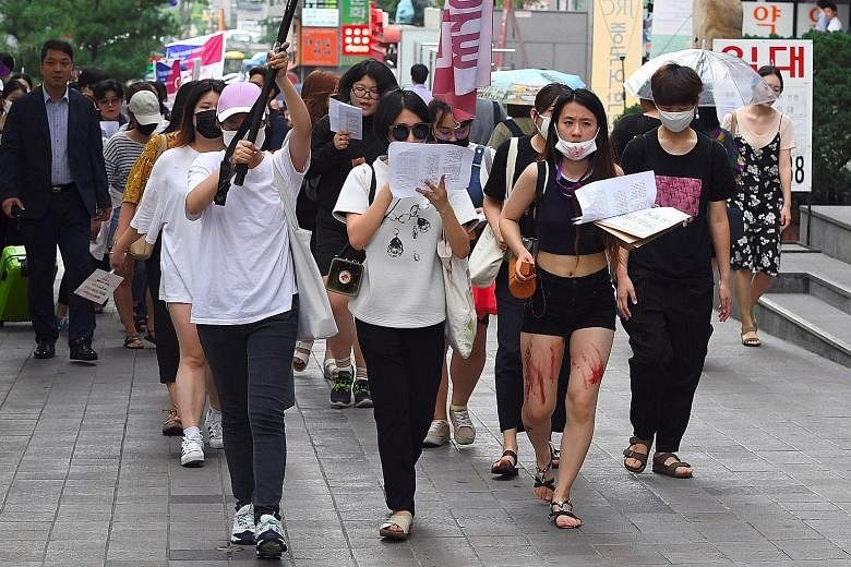 Protesters in Seoul urging tech giants to work harder to curb high-tech sex crimes in August. The country's National Human Rights Commission, which received 203 sexual violence cases last year and helped resolve 173 of them, said it would launch a sp
