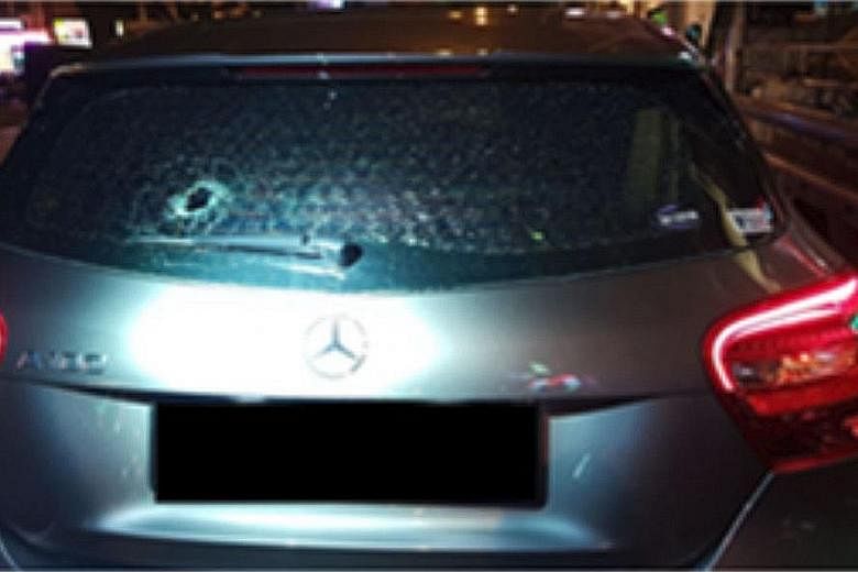 One of the two stationary cars whose rear windscreens were allegedly shattered by pebbles thrown by the suspect.
