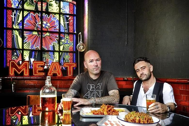 London-based Scott Collins (far left) and Yianni Papoutsis are behind the Meatliquor diner chain that was born in London.
