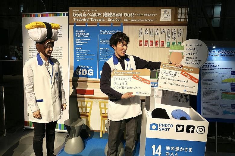 Mr Wing Fong Chow, 74, one of the senior guides at Science Centre Singapore's exhibition on ageing. An interactive exhibit at a parallel exhibition to the Science Centre World Summit 2017 in Tokyo. The exhibit takes the form of a future sushi shop - 