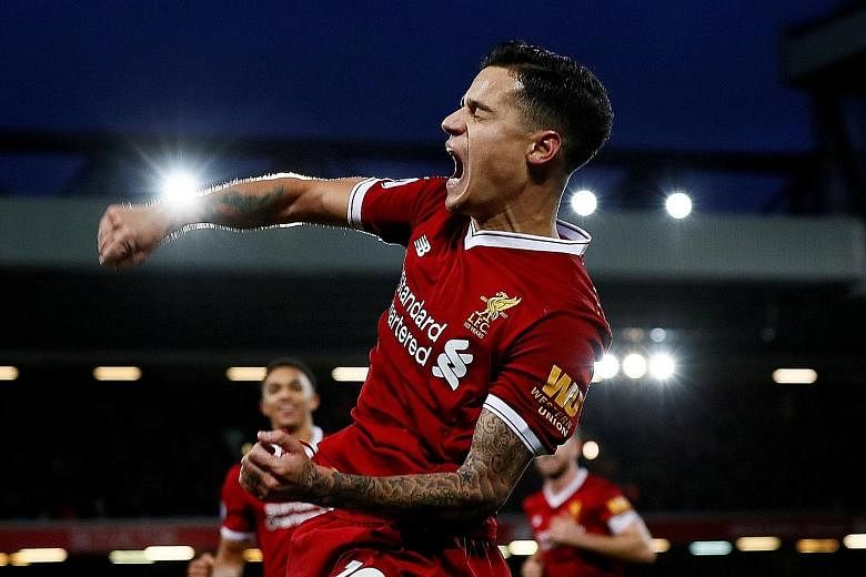 Liverpool's Philippe Coutinho celebrating his goal, his fifth in all competitions, against the Saints on Saturday. A win at Sevilla today will guarantee a last-16 Champions League spot.