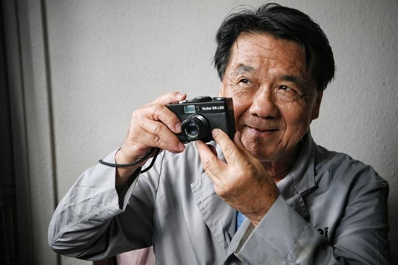 Mr Chong Nam SoyMr Chong, 68, wearing his old Rollei uniform and holding a Rollei 35 compact camera which he helped assemble in the past, in a photo taken last Friday. Mr Chong's experience working at the company, which built its own factory in Kampong Ch