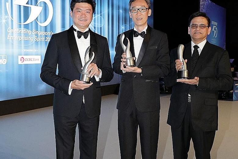 At the Enterprise 50 Awards were (from left) Mr Lee Yong Miang, managing director of Expand Construction which clinched third place; Mr Lam Keng Yew, managing director of Onn Wah Precision Engineering which won the top prize; and Mr Naarayan Raaghava