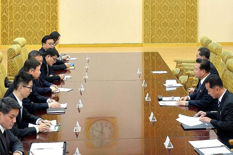 China's special envoy Song Tao (third from left) and other Chinese diplomats at a meeting with North Korea's Choe Ryong Hae (second from right), a member of the Presidium of the Political Bureau of the Central Committee of the Workers' Party of Korea