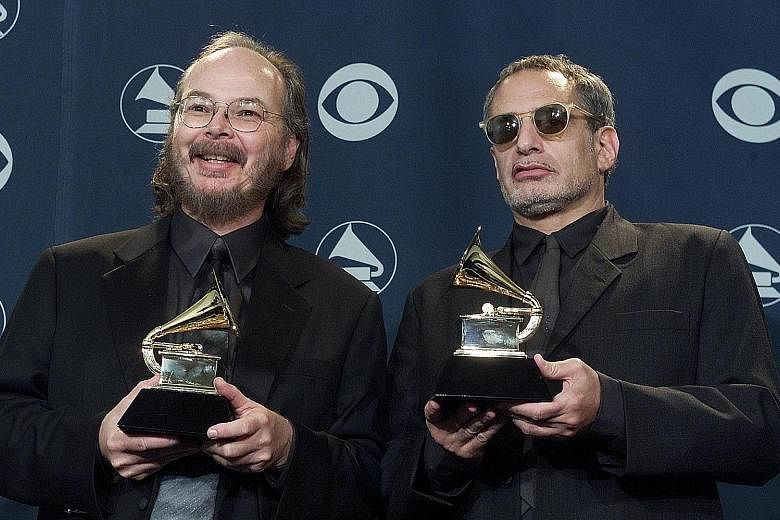 Steely Dan's Donald Fagen (left, in a 2001 photograph) is taking the estate of his late fellow member Walter Becker (far left) to court.