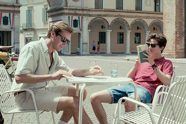 Armie Hammer (right) and Timothee Chalamet (far right) in Call Me By Your Name.
