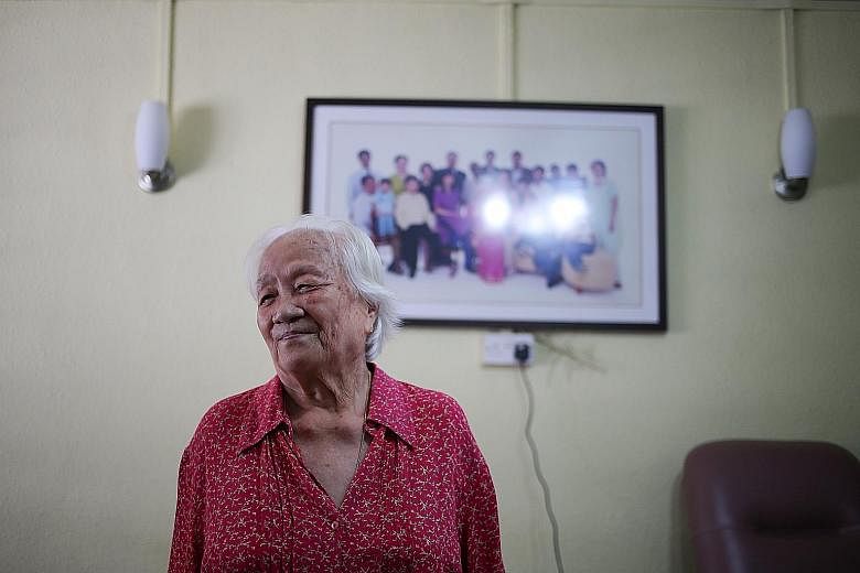 Above: Madam Indranee Nadisen, 77, at her home, where she lives with her husband and maid. She looked after 43 children over 32 years of fostering children who were abandoned or abused by their own parents, until health concerns forced her to stop do
