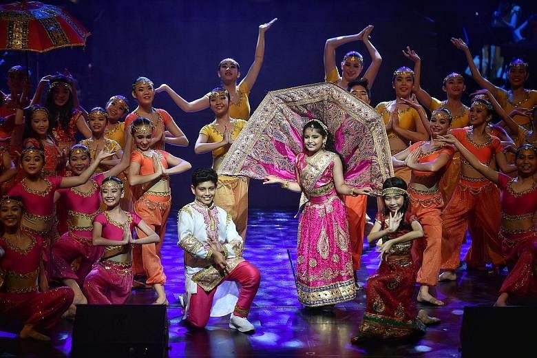 Taking centre stage are (from left) Aadeetiya Jayashanker, Jyotsnaa Jayashanker and Annette Yeong as they perform the song Mustapha during the India segment. They are joined by Jitterbugs Swingapore, ChildAid Dancers and ChildAid Symphonettes. Gisele