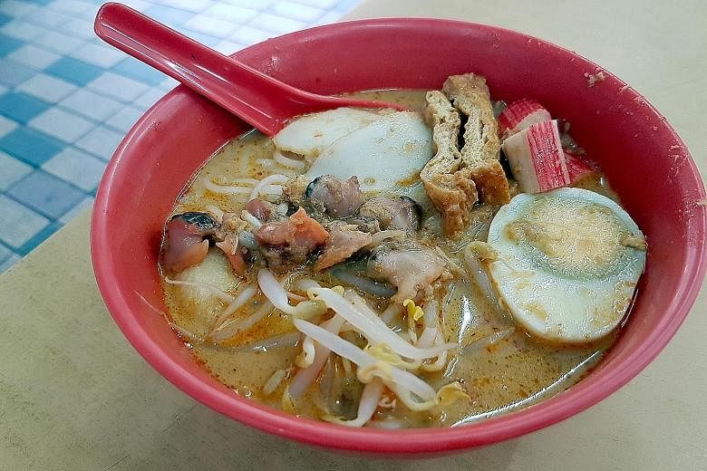 The laksa comes with bean sprouts, fish cake, tau pok, cockles and boiled egg, as well as the more unique offering of crab sticks.