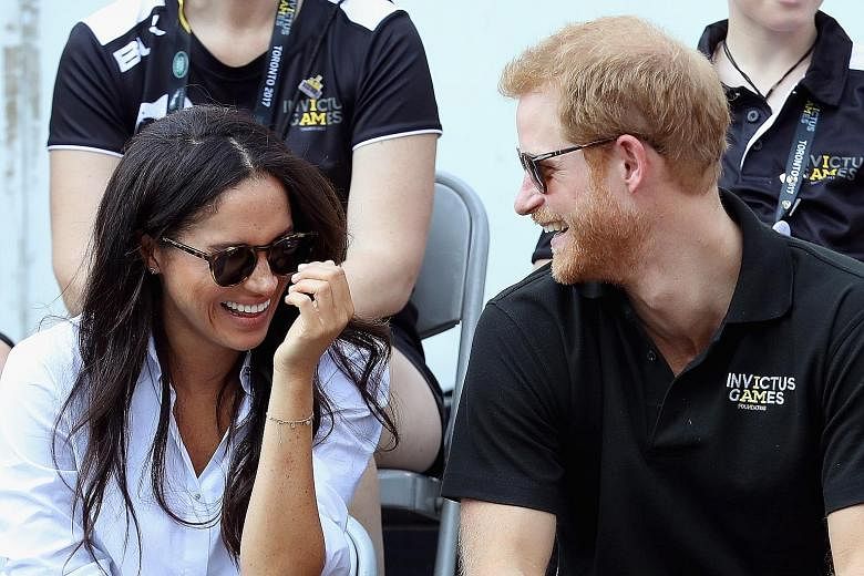 Britain's Prince Harry and American actress Meghan Markle (both above) at the Invictus Games in Toronto, Canada, in September.