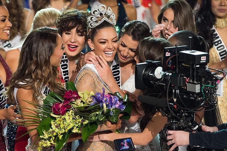 Miss South Africa Demi-Leigh Nel-Peters is congratulated by fellow contestants after being crowned Miss Universe at the end of the three-hour special programme on Fox. Contestants from around the world converged in Las Vegas on Sunday, where the 22-y