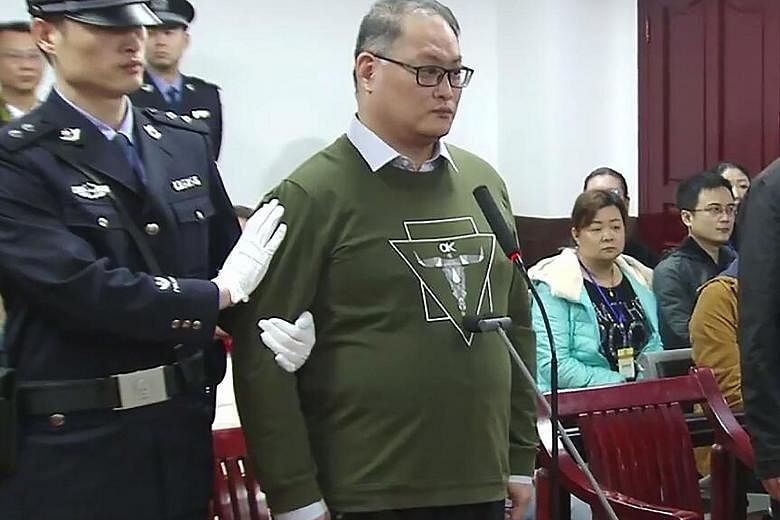 Activist Lee Ming-cheh in court yesterday. He is the first Taiwanese person to be convicted in China on the political charge.