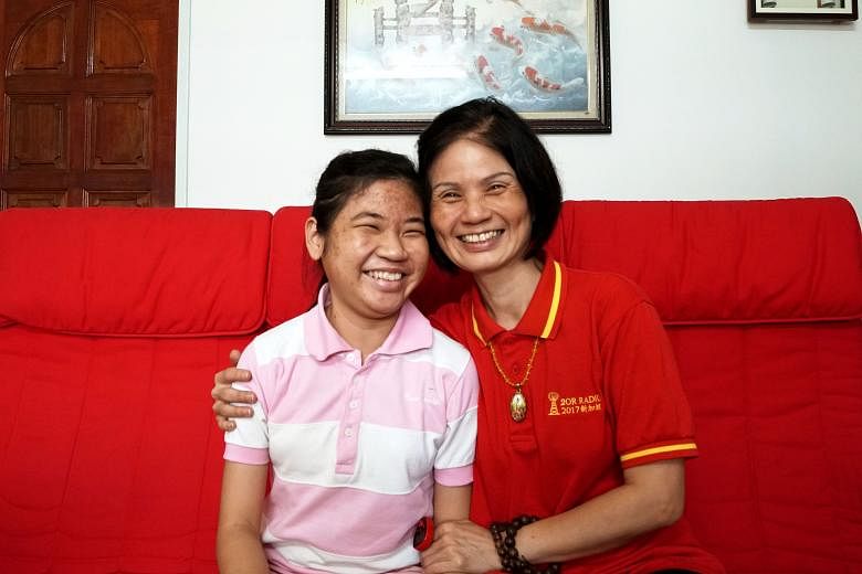 Last month, Miss Tan Xing En, 23, received the gift she had long been waiting for - a kidney and a new lease of life. Miss Tan - pictured here with her mother, housewife Lee Siew Chow, 53 - is also blind due to retinitis pigmentosa.