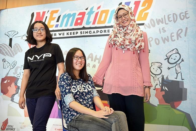 Nanyang Polytechnic students (from left) Vivian Lim, 18, Yeon Hui Shan, 19, and Nur Khairina Asmi, 20, spent a month making the film Everyday Heroes, highlighting teamwork and unity in a time of crisis.