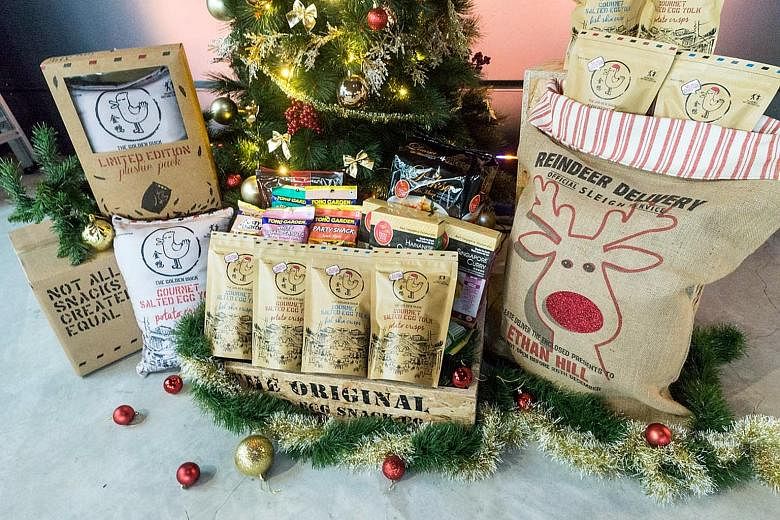 The Straits Times and home-grown snack company The Golden Duck are partnering to produce the festive packages.