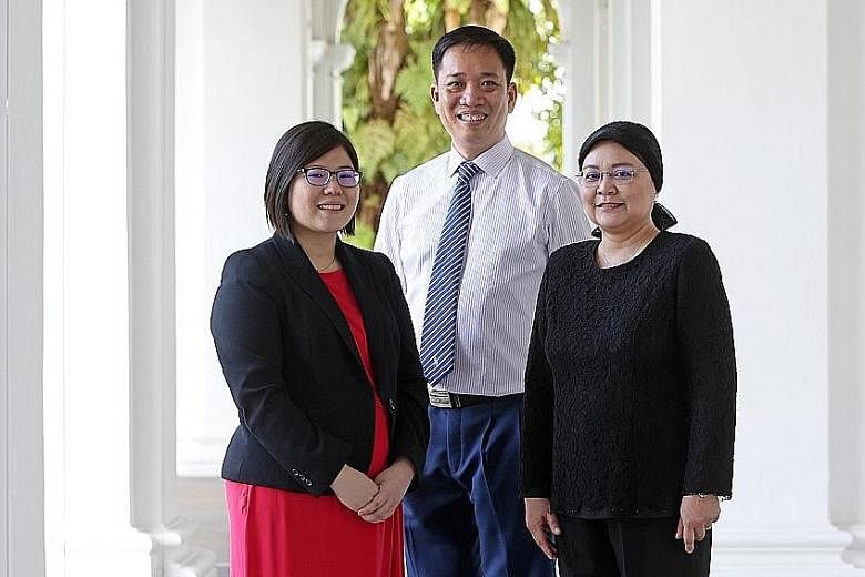 From far left: Promising Social Worker Award recipient Kristine Lam with Outstanding Social Worker Award recipients Vincent Ng and Zahara Mahmood. Ms Lam says seeing difficult cases does not make her sad or disillusioned but rather, drives her to wan
