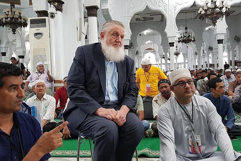 American Muslim preacher Yusuf Estes was denied entry into Singapore over his "unacceptable" views and did not join the cruise. On the left is Islamic Cruise owner Suhaimi Abd Ghafer.
