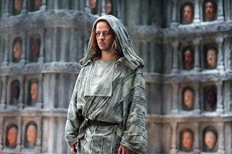 German actor Tom Wlaschiha (above) as the mysterious Jaqen H'ghar (left) in Game Of Thrones.
