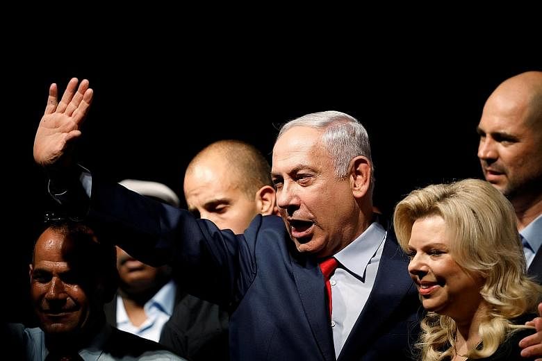 Israeli Prime Minister Benjamin Netanyahu and his wife Sara during a Likud party event this year.