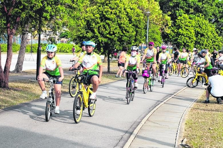 Above: (front row, from left) Ageless Bicyclists' Mr Malcolm Chen, 72, with volunteers Ivan Lim, 55, (second row, from left) Patsy Lim, 63, Lee Geok Yian, 62, John Cheng, 80, (back row, from left) David Leong, 64, Justine Sim, 45, K.C. Au Yeong, 66, 