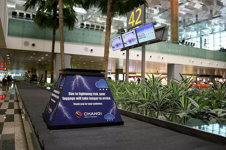 During rainy weather, ground handlers may temporarily stop retrieving baggage from the aircraft because there is no shelter where they work and it is a lightning-risk area. "Lightning cubes" with a message seeking passengers' understanding will be pl