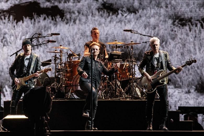 U2 show how bittersweet, stadium-sized rock anthems are done in their new album.