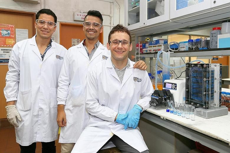 From far left: Research fellows Orlando Gracia Rodriguez and Hugo Olvera Vargas with Assistant Professor Olivier Lefebvre at the Centre for Water Research at NUS.