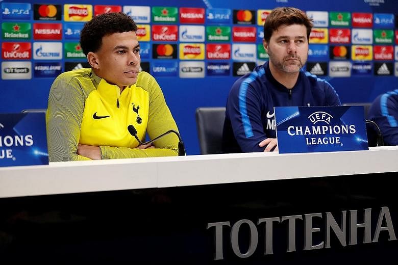 Tottenham's Dele Alli and his manager Mauricio Pochettino at the pre-match conference. The Spurs midfielder will be hoping to play his way back into form against Apoel.