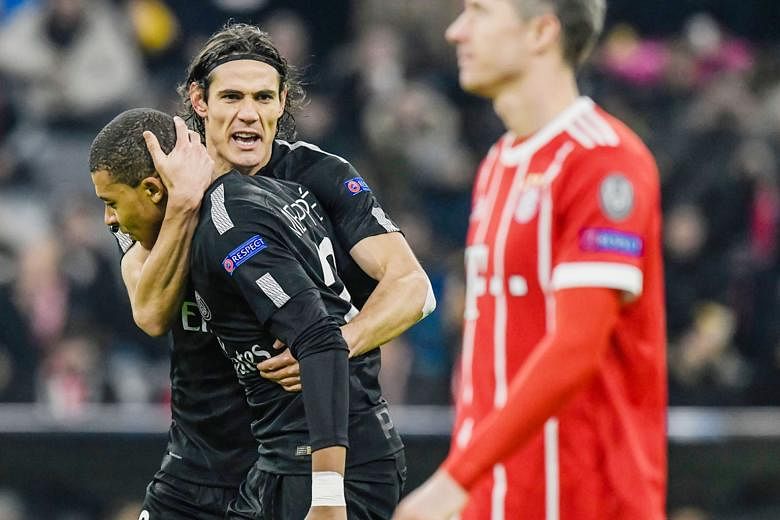 PSG's Edinson Cavani congratulating team-mate Kylian Mbappe after the Frenchman pulled a goal back against Bayern Munich. The Group B winners need to play better in the last 16.