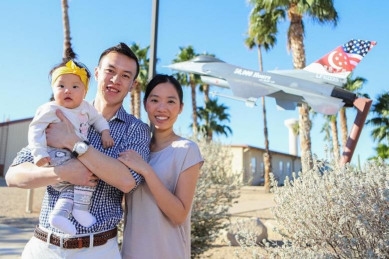Fighter pilot Cedric Goh with his wife Lissa Low and baby Joy. He began his stint at the Luke Air Force Base in Phoenix in January last year.