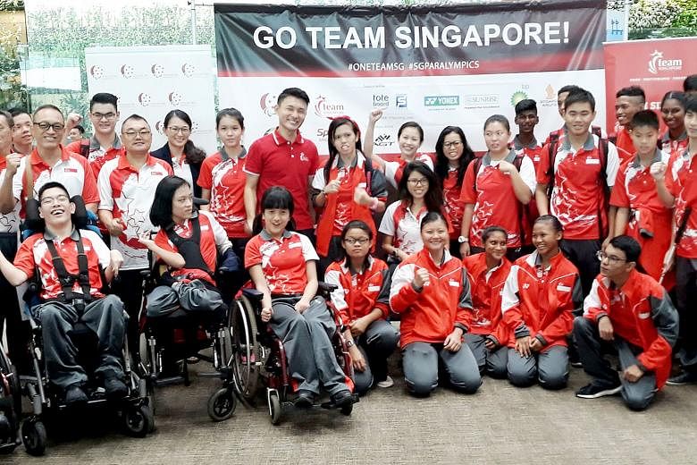 Singapore's Asian Youth Para Games contingent at Changi Airport yesterday. Chef de mission Yip Pin Xiu is in the back row, seated. Guest of honour Baey Yam Keng, Parliamentary Secretary for Culture, Community and Youth is standing in the back row, in