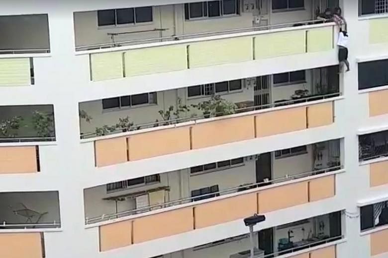 (From left) The maid climbs out of the window of the room; she walks along the ledge towards the tenant in the corridor outside the unit; the tenant and a police officer grab the maid and try to pull her over the railings; and she is finally pulled t