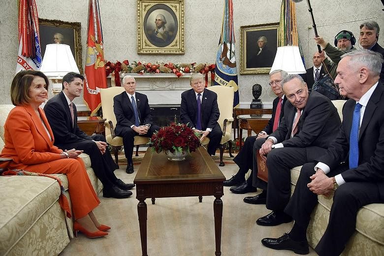 President Donald Trump at a meeting at the White House on Thursday with (from left) House Minority Leader Nancy Pelosi, House Speaker Paul Ryan, Vice-President Mike Pence, Senate Majority Leader Mitch McConnell, Senate Minority Leader Chuck Schumer a