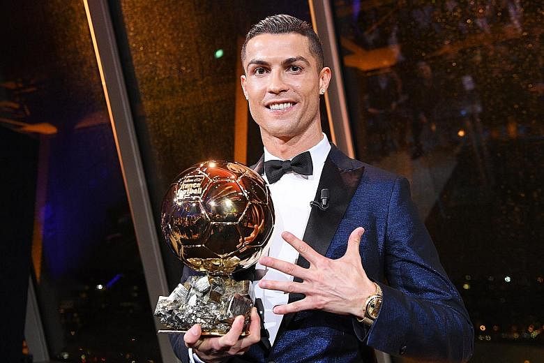 Portuguese striker Cristiano Ronaldo after receiving the 62nd Ballon d'Or award in Paris. He has had a lean spell this season in LaLiga with just two goals in 10 games but this week became the first player to score in all six Champions League group g