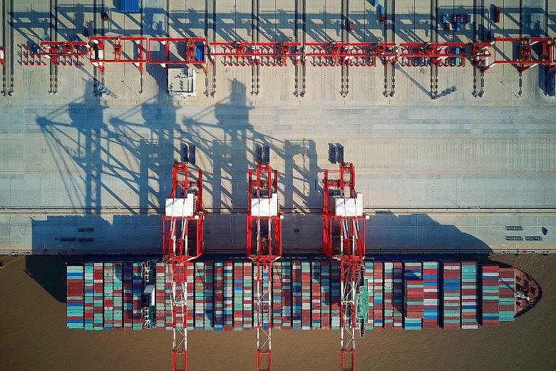 A cargo ship at the Yangshan Deep-Water Port in Shanghai. China's exports grew more than twice the expected pace last month, official data shows.