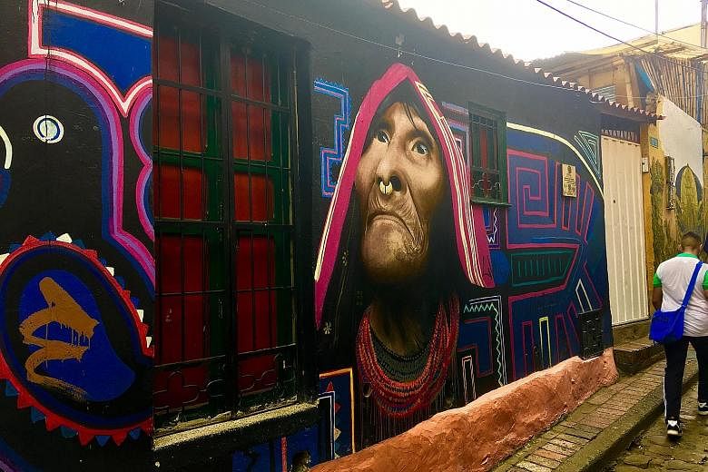 Bogota has become a world-renowned hot spot for street art by both local and international names, such as the murals (above) of Carlos Trilleras. Usaquen, a lively village in Bogota, is packed with bars and restaurants. A view of Bogota's vast, Andes