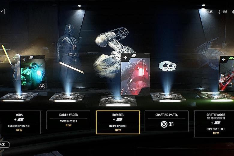 Items found in a US$1 (S$1.35) loot box from EA's Star Wars Battlefront II game with five items that range in game play value. For example, the Yoda item allows a player to access one of Yoda's abilities in-game, while the Darth Vader one is merely a