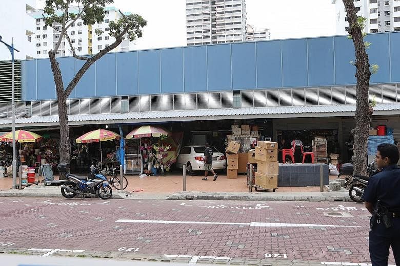 A car driven by a 51-year-old man crashed into a florist's stall in a market at Block 50A, Marine Terrace yesterday at around 12.30pm. He was arrested by police for causing grievous hurt by a negligent act.