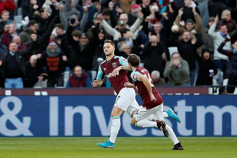 West Ham's Marko Arnautovic celebrating his goal with Mark Noble. It was the Austrian striker's first goal since his arrival from Stoke.