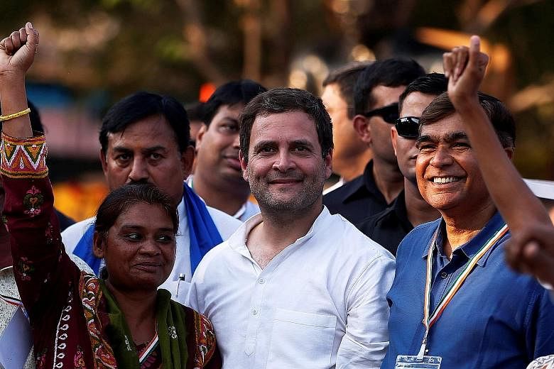 Mr Rahul Gandhi with supporters at a rally near Ahmedabad last month ahead of Gujarat state assembly elections. Known for his love of reading and racing motorbikes, Mr Gandhi has little to show in terms of political success. While he has been prepari