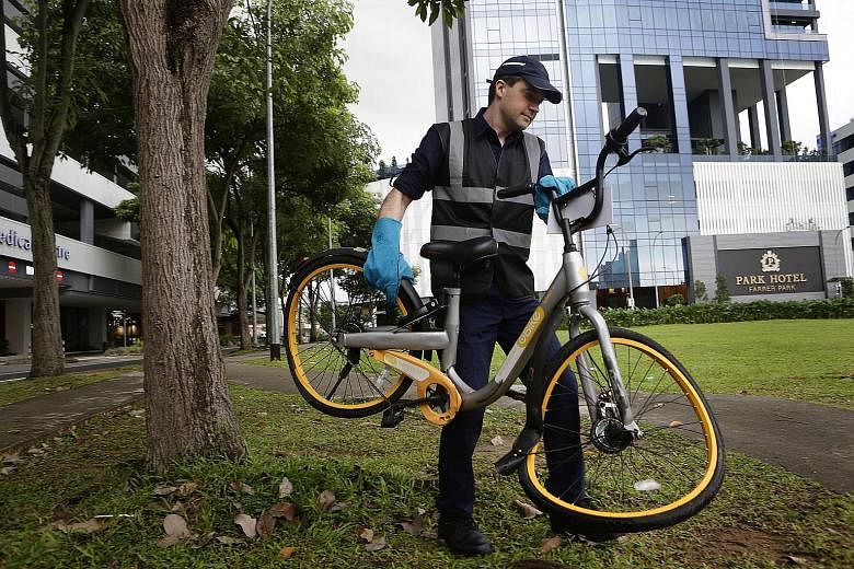 Mr Zhivko Girginov, with a bike found in the Farrer Park area yesterday. He focuses on damaged bikes which may pose a threat to the safety of users.