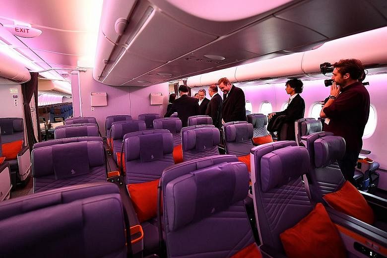 Premium economy seats in SIA's new A-380, at the Airbus Delivery Centre in Toulouse, France, yesterday. The reconfigured cabin in the superjumbo has 471 seats - six ultra-first class suites, 78 in business class, 44 in the premium economy cabin and 3