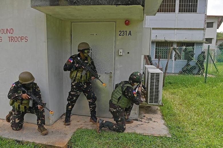 It was mission accomplished for 23 elite troops from the Philippines after they "stormed and captured" a number of buildings in their final exercise at the Murai Urban Training Facility in Lim Chu Kang yesterday. 	The Philippine soldiers are in Singa